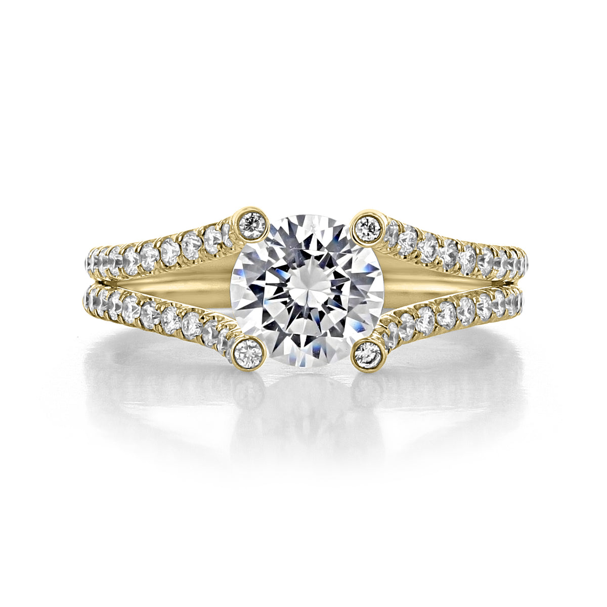 Danhov Solo Filo | Micro-Prong Engagement Ring - SE101 in gold, featuring a round center stone and a split shank encrusted with pavé-set diamonds.