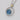 A round, faceted London blue topaz Gemma Bloom Bold London Blue Topaz Fashion Necklace | SN14133 set in a circular silver pendant with an 18k yellow gold accent, hanging from a silver chain.