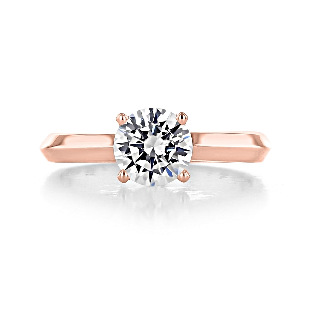 Elara Round Solitaire Engagement Ring featuring a round diamond set on a rose gold knife-edge band.