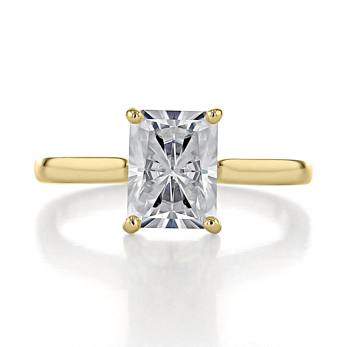 Beverly | Radiant Solitaire Engagement Ring featuring a radiant-cut solitaire diamond on a 14k yellow gold band.