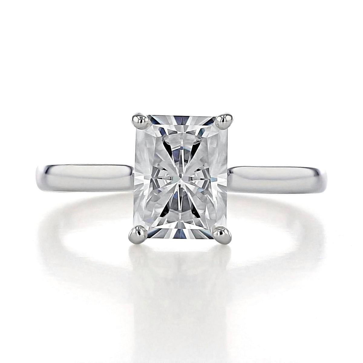 Beverly | Radiant Solitaire Engagement Ring featuring a radiant-cut diamond in a 14k white gold band with a four-prong setting.