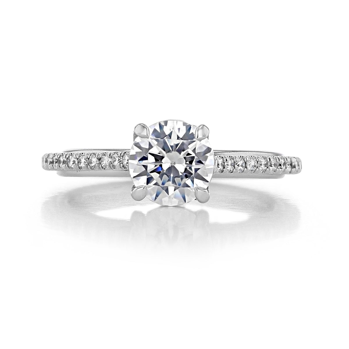 A Danhov Unito | Engagement Ring - UE107 featuring a round-cut diamond on a pavé-set band.