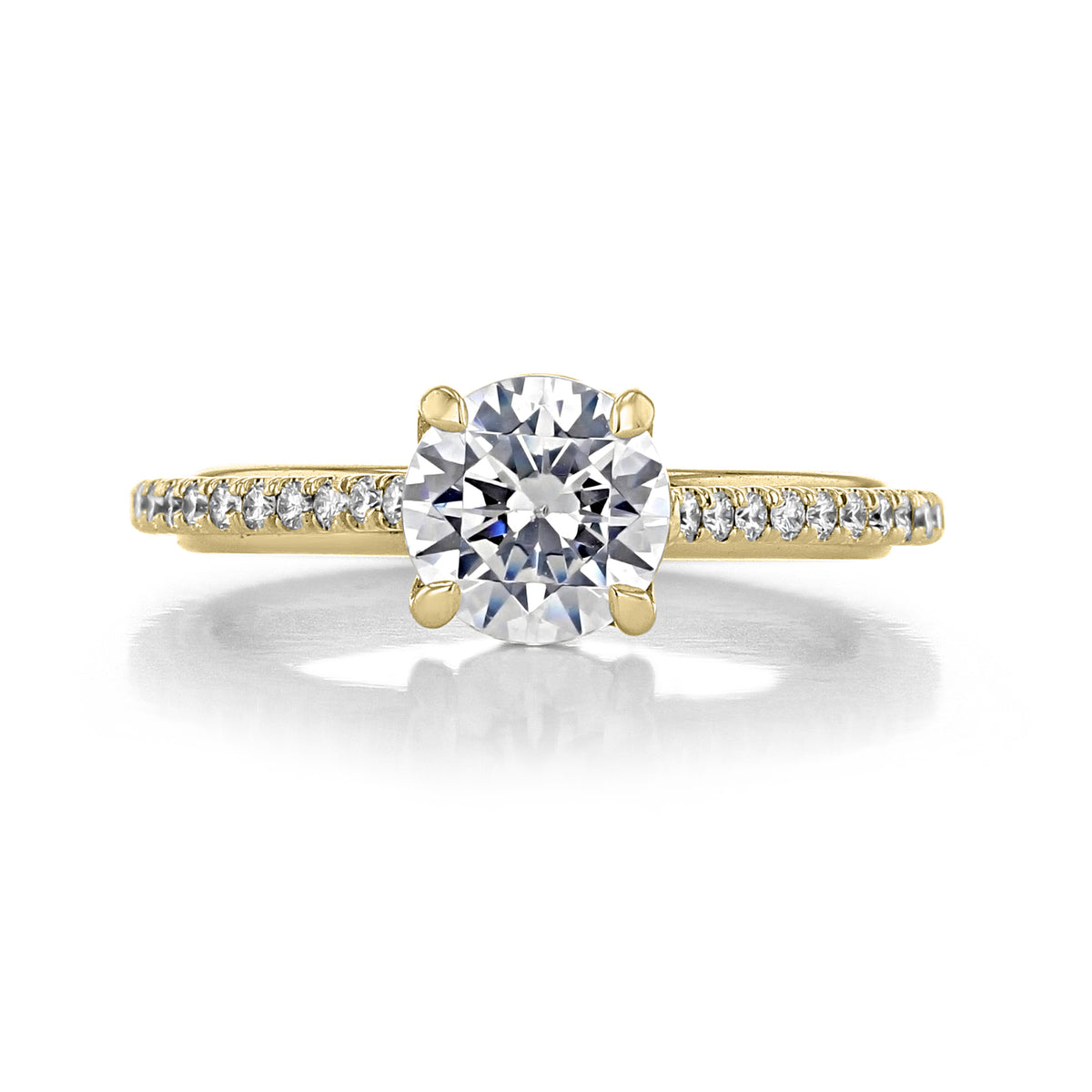 Danhov Unito | Engagement Ring - UE107 featuring a gold band with a round brilliant-cut center diamond and smaller micro-prong diamonds.