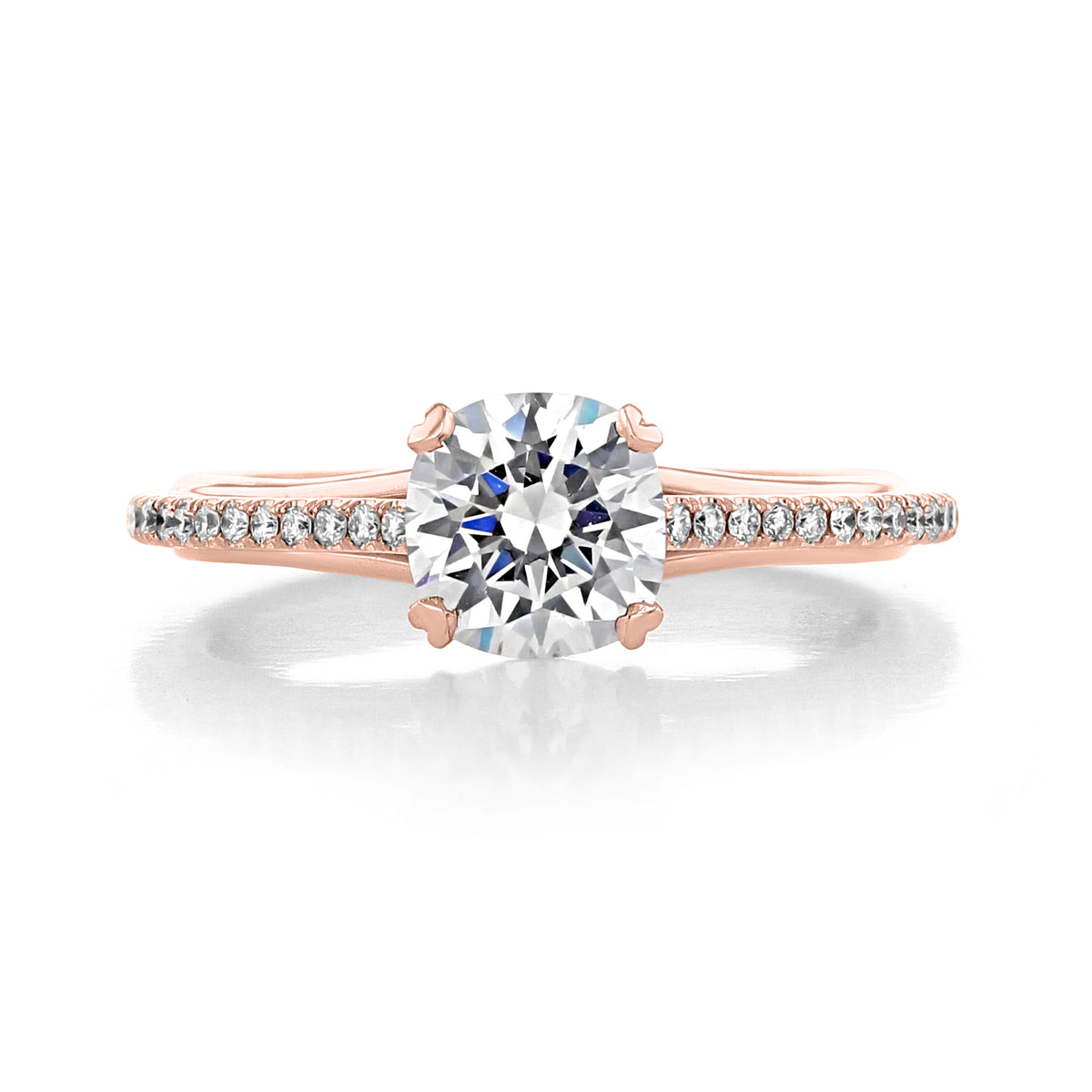 Danhov Unito | Micro-Prong Engagement Ring - UE111 in rose gold featuring a round-cut center diamond held by four prongs on a pavé-set diamond band.