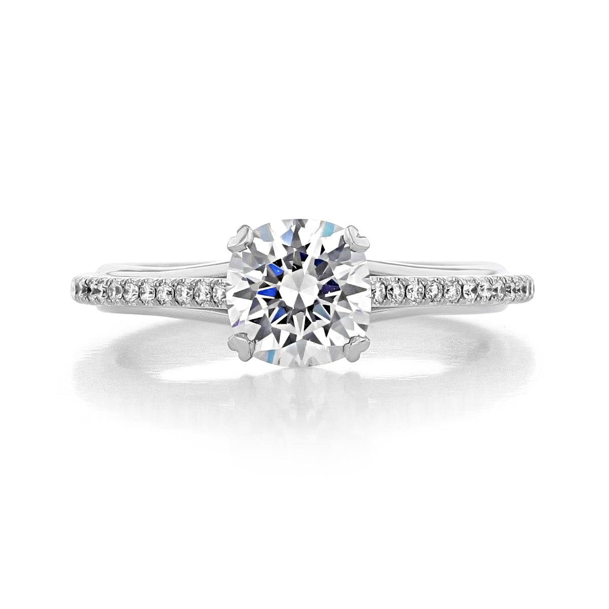 A Danhov Unito | Micro-Prong Engagement Ring - UE111 featuring a round brilliant-cut diamond and a micro-prong split-shank band.
