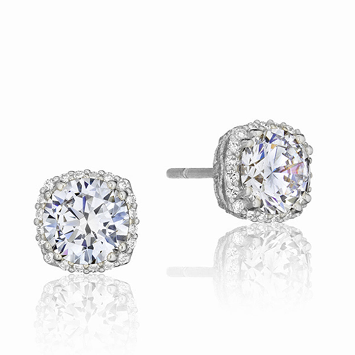 Tacori Dantela Fashion Earrings FE64365 in 18k white gold featuring a central round-cut stone surrounded by a halo of small pavé diamonds in a milgrain setting.
