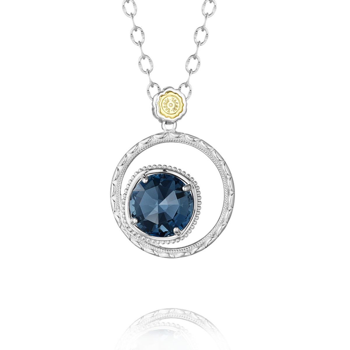 Gemma Bloom Bold London Blue Topaz Fashion Necklace SN14133 featuring a round London blue topaz stone in an openwork silver circle pendant, suspended from a silver chain with an 18k yellow gold accent piece.